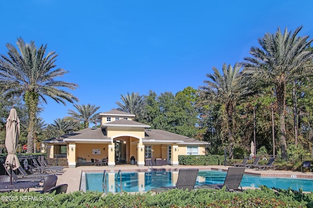 view of pool featuring a patio