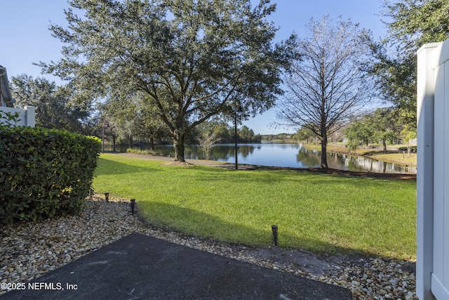 view of yard with a water view