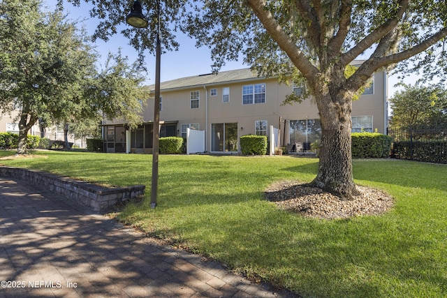 exterior space featuring a front lawn