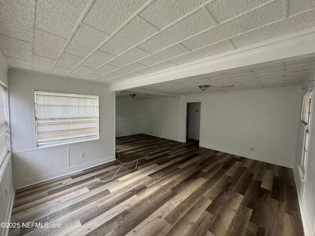 spare room featuring dark hardwood / wood-style floors