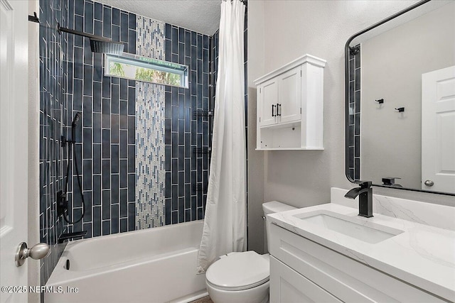 full bathroom featuring vanity, a textured ceiling, toilet, and shower / bath combo with shower curtain