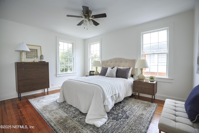 bedroom featuring hardwood / wood-style flooring and ceiling fan