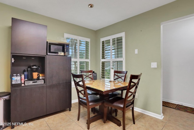 view of tiled dining space