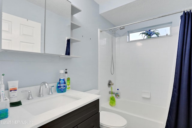 full bathroom with a textured ceiling, vanity, toilet, and shower / bath combo with shower curtain