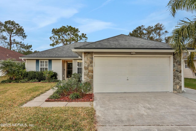 ranch-style house with a garage and a front lawn