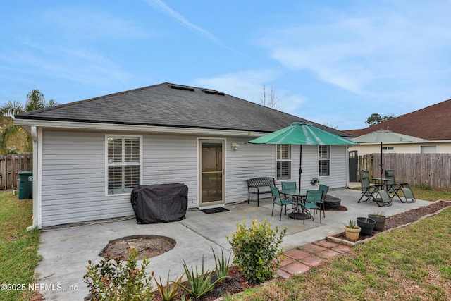 back of property featuring a patio