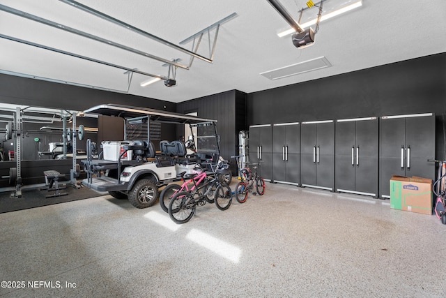 garage featuring a garage door opener