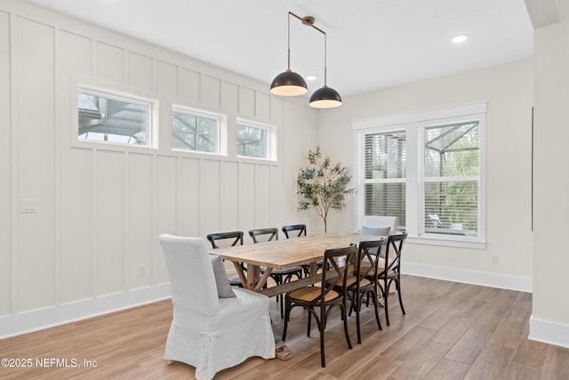 dining space featuring light hardwood / wood-style flooring