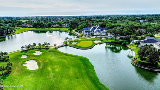 drone / aerial view with a water view