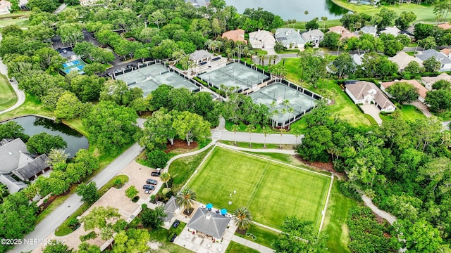 birds eye view of property featuring a water view