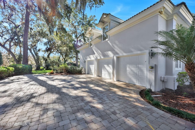 view of home's exterior with a garage