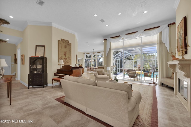 living room featuring a textured ceiling, crown molding, and a premium fireplace