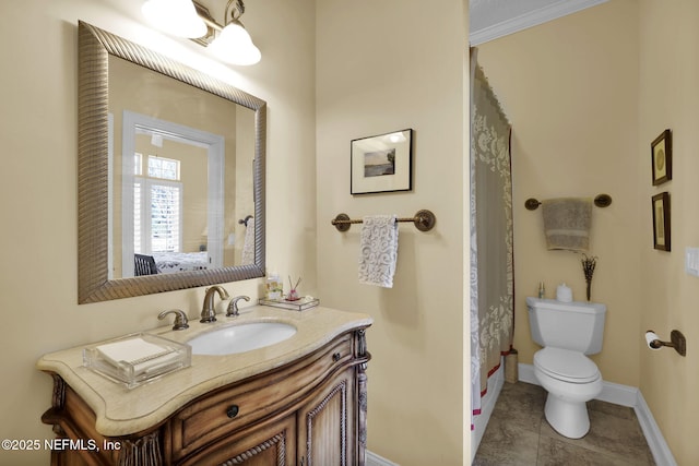 bathroom with toilet, crown molding, tile patterned floors, and vanity