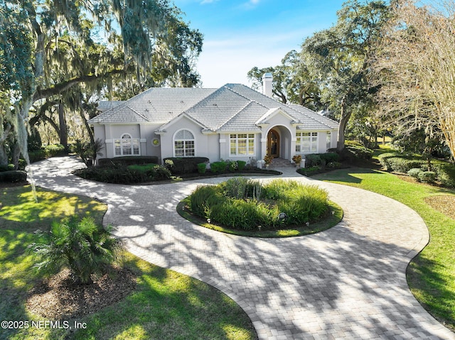 view of front of home with a front yard