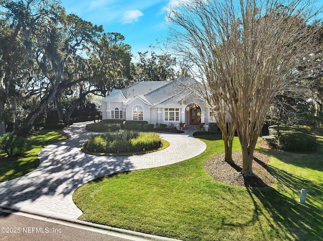 view of front of home with a front lawn