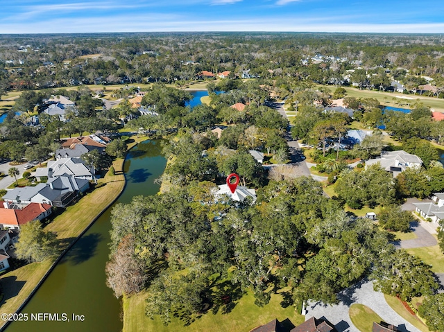 drone / aerial view with a water view