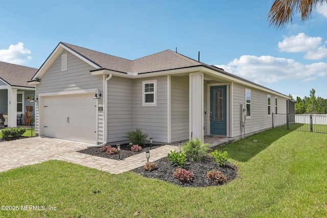 234 Thistleton Way, Saint Augustine, FL 32092 - view of front of home featuring decorative driveway, an attached garage, and a shingled roof