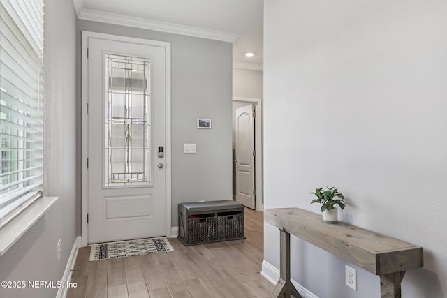 234 Thistleton Way, Saint Augustine, FL 32092 - entryway featuring ornamental molding and light wood finished floors