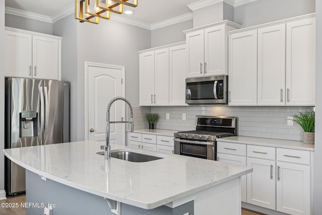 234 Thistleton Way, Saint Augustine, FL 32092 - kitchen featuring appliances with stainless steel finishes, backsplash, white cabinets, crown molding, and light stone counters
