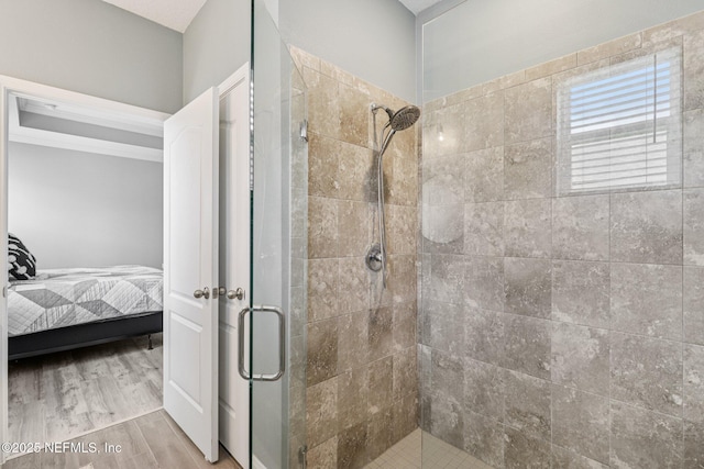 234 Thistleton Way, Saint Augustine, FL 32092 - ensuite bathroom featuring a stall shower and wood finished floors