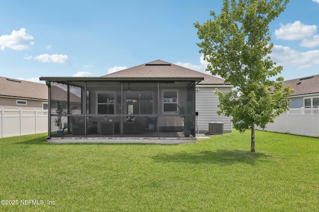234 Thistleton Way, Saint Augustine, FL 32092 - rear view of house with a sunroom, a fenced backyard, and roof with shingles