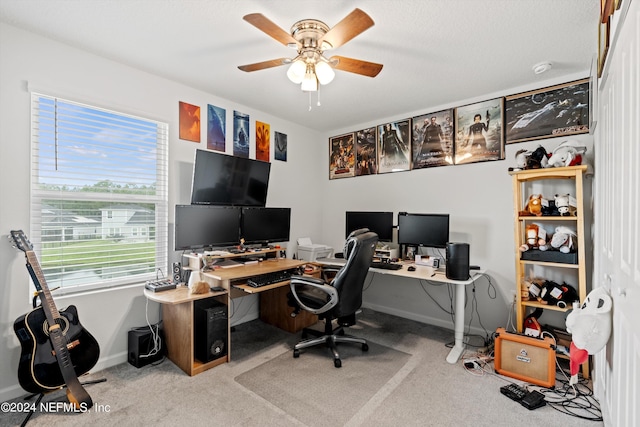 office area with light carpet and ceiling fan