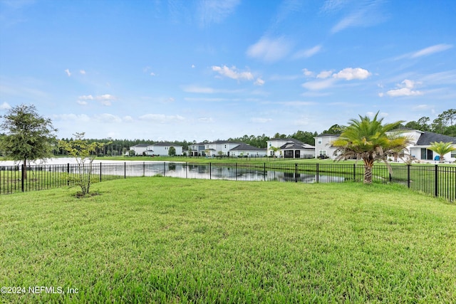 view of yard with a water view