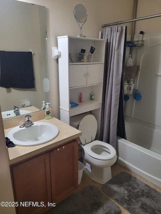 full bathroom with vanity, toilet, and shower / bath combo