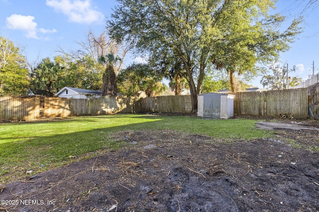 view of yard with a storage shed