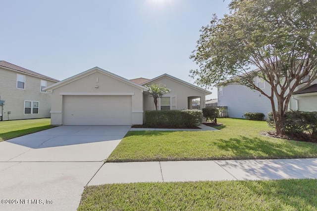 ranch-style home with a garage and a front lawn