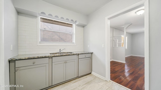 bathroom featuring plenty of natural light and vanity