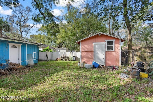 view of yard with a storage unit