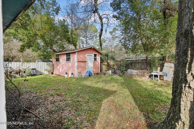 view of yard featuring a storage unit