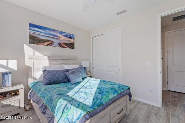 bedroom featuring ceiling fan and a closet