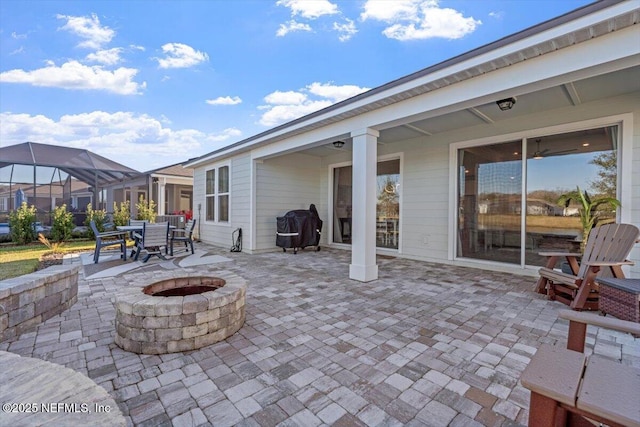 view of patio featuring a fire pit