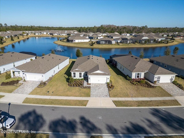 bird's eye view with a water view