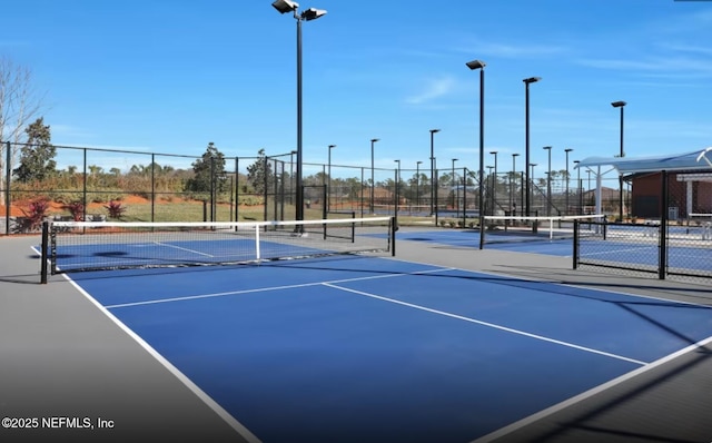 view of sport court featuring basketball hoop