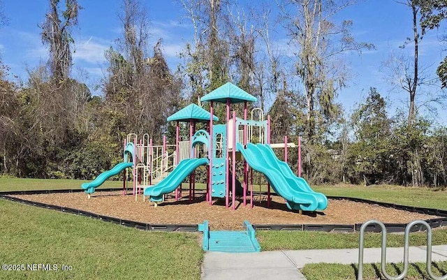 view of jungle gym featuring a yard