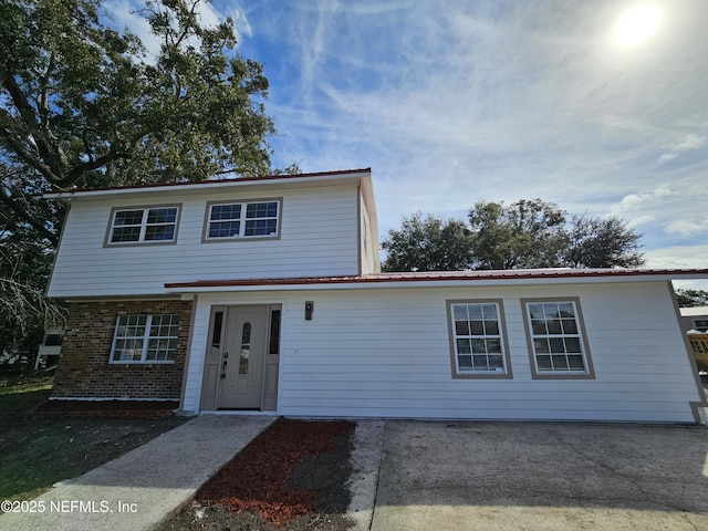 view of property featuring a patio