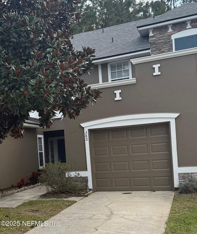 view of front of house with a garage