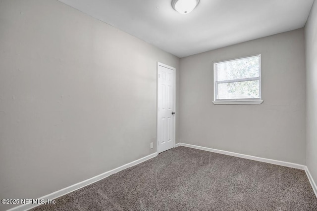 empty room featuring carpet flooring