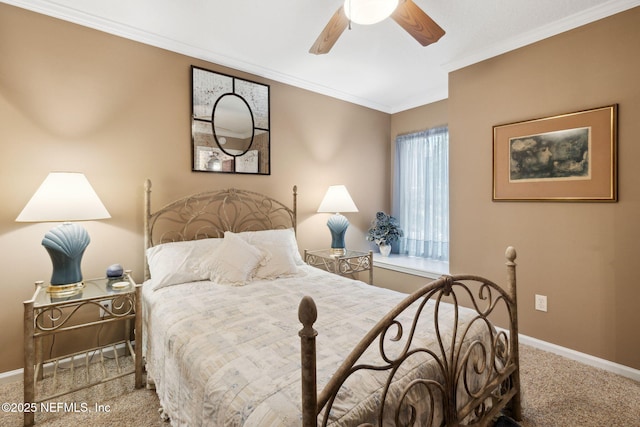 bedroom featuring ornamental molding, carpet floors, and ceiling fan