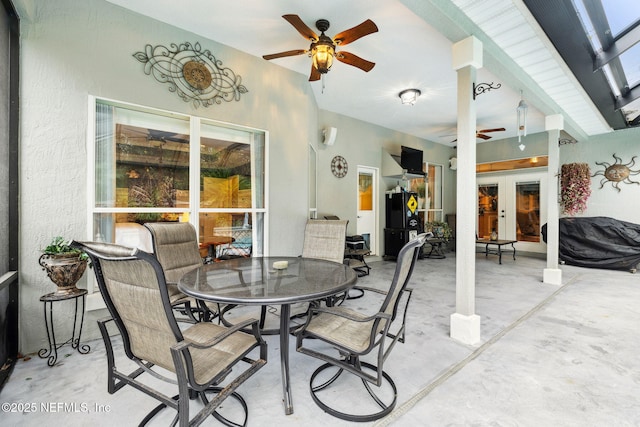 view of patio featuring area for grilling and ceiling fan