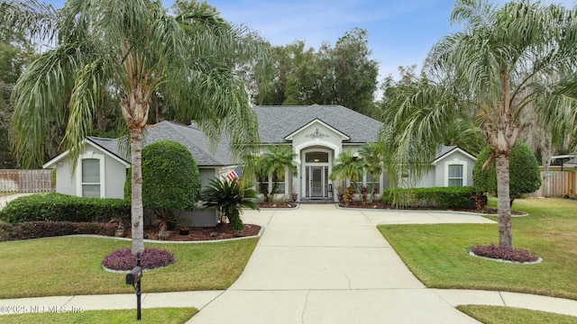 view of front of house with a front lawn