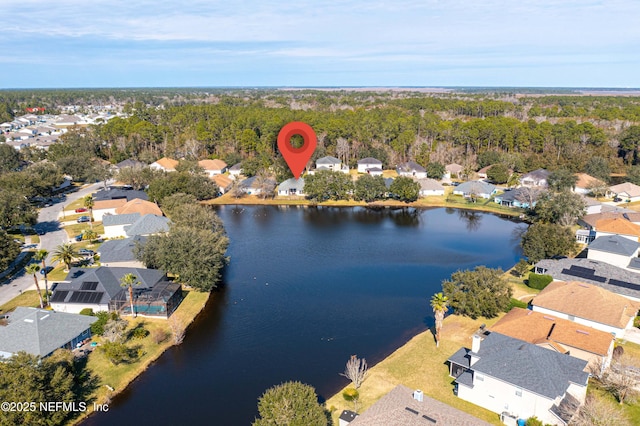 aerial view with a water view and a residential view