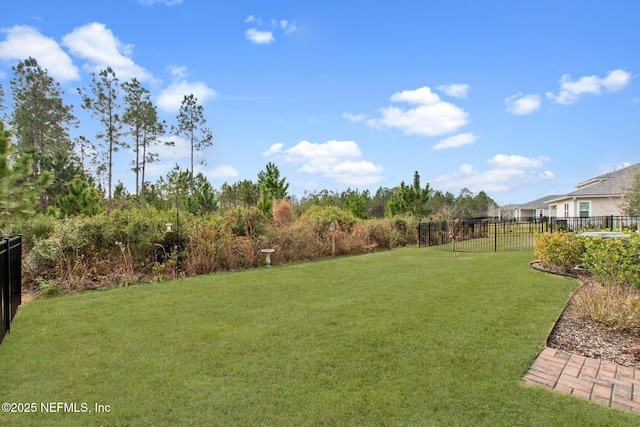 view of yard featuring fence