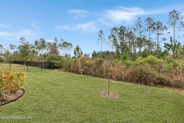 view of yard featuring fence