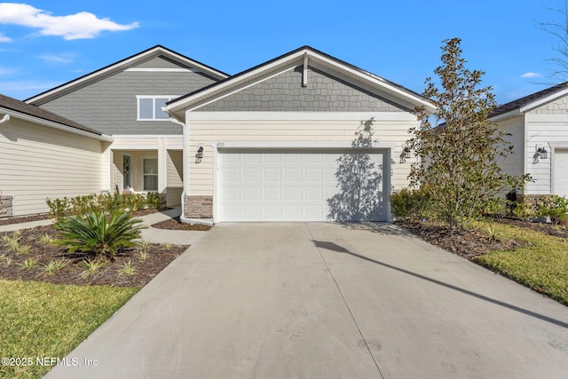 craftsman house with a garage