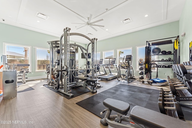 exercise room with ceiling fan