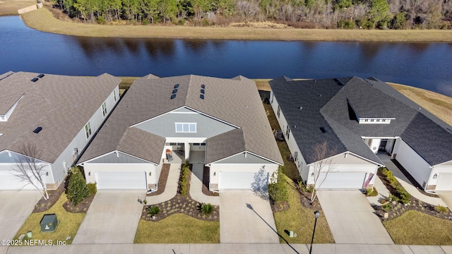 aerial view featuring a water view